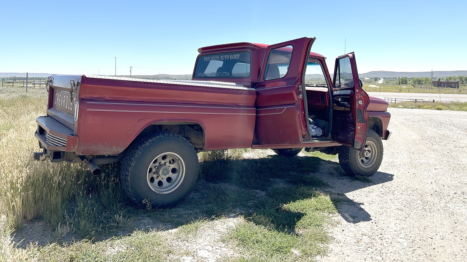 Red is a custom pickup with nearly 700,000 miles on it built by Lloyd Reiter of Daniel, Wyoming. It has a Chevy body, Dodge chassis and Cummins engine.