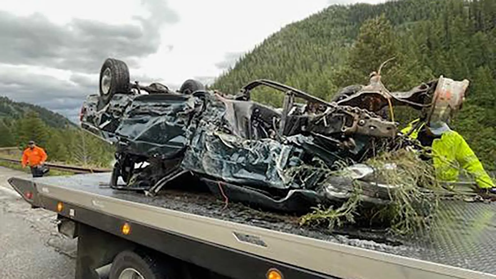 Man Survives After Crashing Truck Through Guardrail And Plunging Into ...