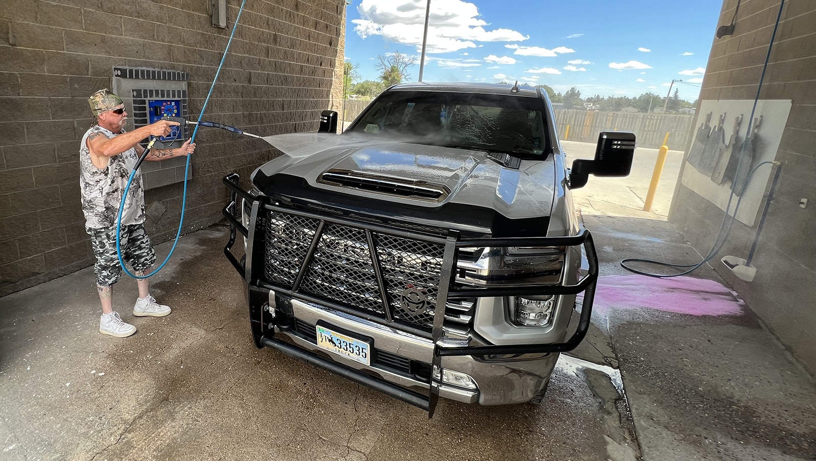 Mark Fillmore of Cheyenne washes his 2020 Chevy 2500 Silverado. While his is a work truck, Fillmore said he has another truck at home and that he's a truck guy through and through.