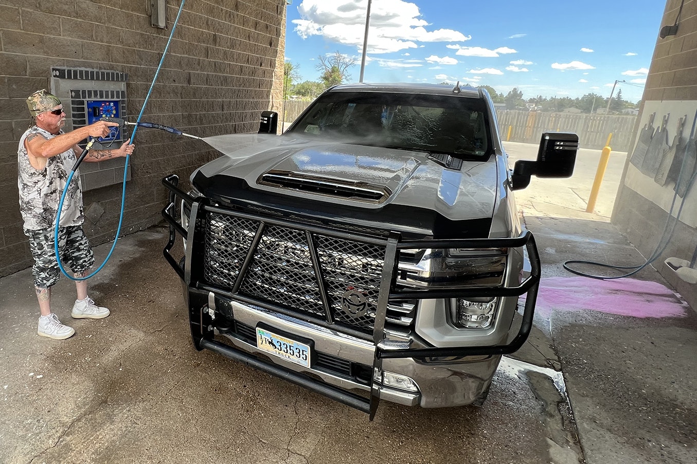 Mark Fillmore of Cheyenne washes his 2020 Chevy 2500 Silverado. While his is a work truck, Fillmore said he has another truck at home and that he's a truck guy through and through.