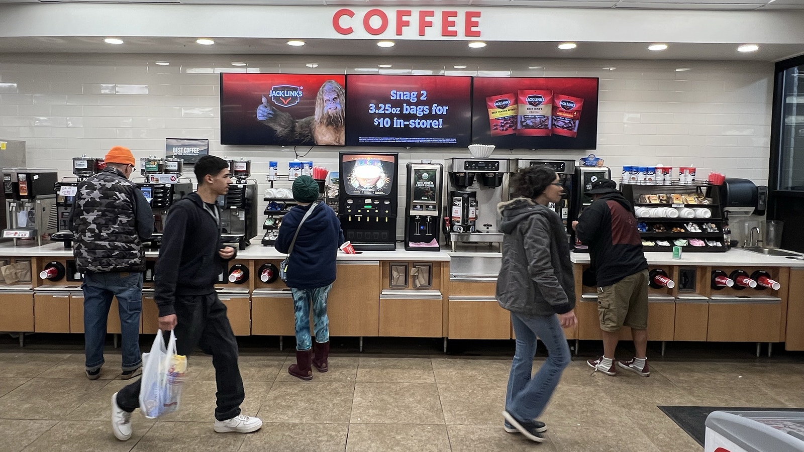 Activity around the coffee counter at the Pilot Flying J truck stop in Cheyenne off Interstate 25 picks up at about 6 a.m.