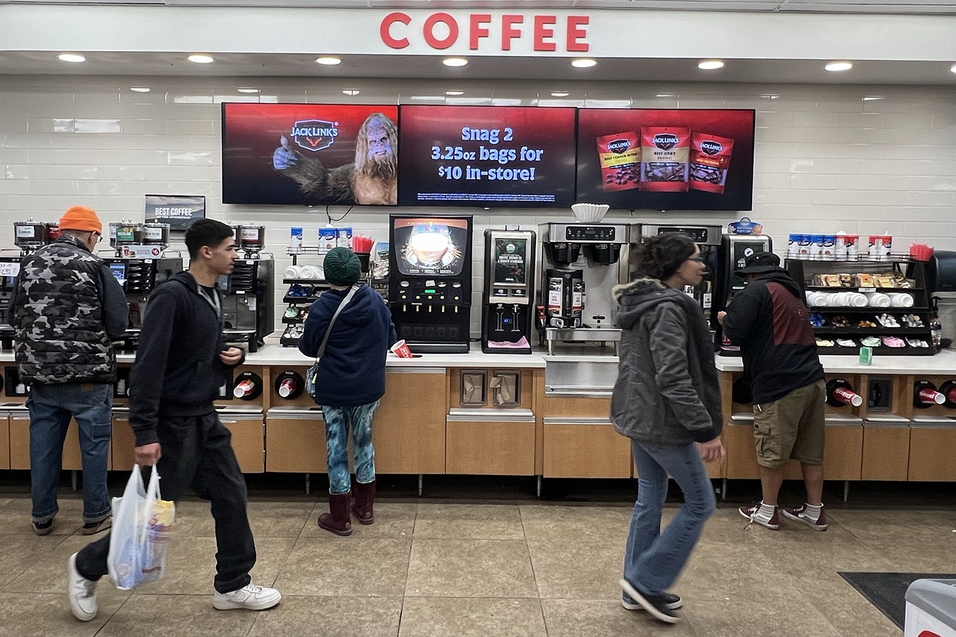 Activity around the coffee counter at the Pilot Flying J truck stop in Cheyenne off Interstate 25 picks up at about 6 a.m.
