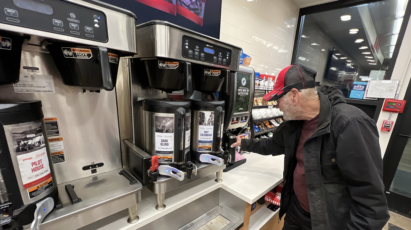 Carl Pyle, a long-haul trucker taking a load from Oklahoma to Everett, Washington, gets his morning coffee at the Flying J in Cheyenne on Saturday. He said a truck stop running out of coffee would be "worse than if they ran out of diesel at the pumps."