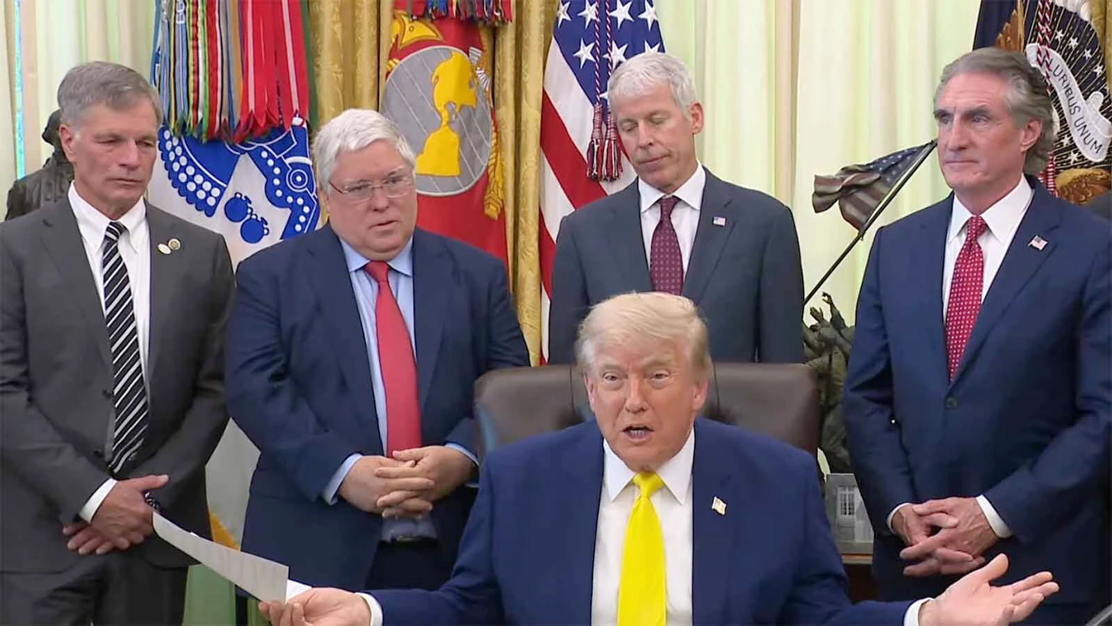 Wyoming Republican Gov. Mark Gordon, left, joined President Trump in Washington, D.C., on Thursday as the president allocated $700 million in public money for the coal industry. 