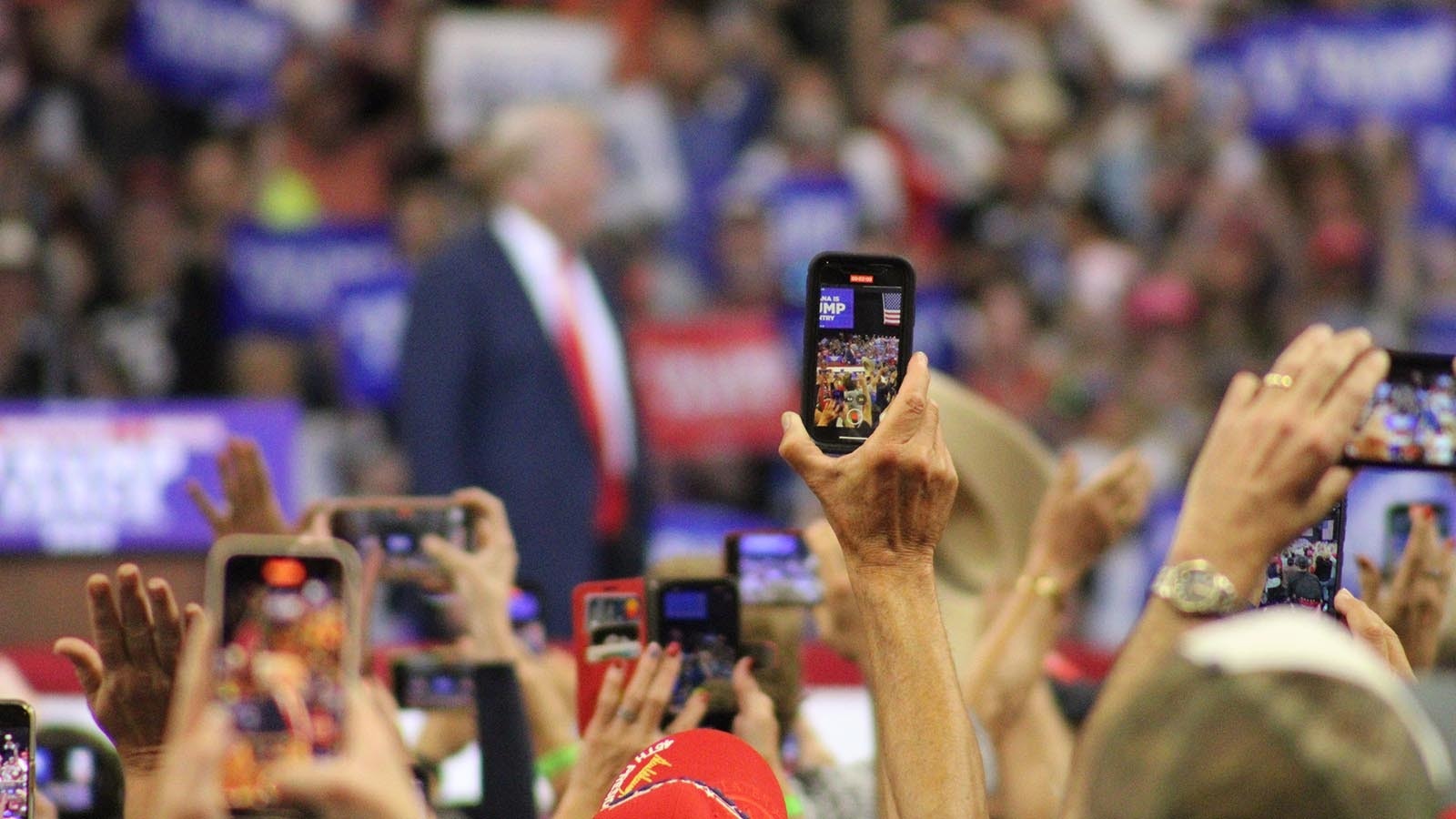 Rallygoers cheer for former President Donald Trump in Bozeman on Friday.