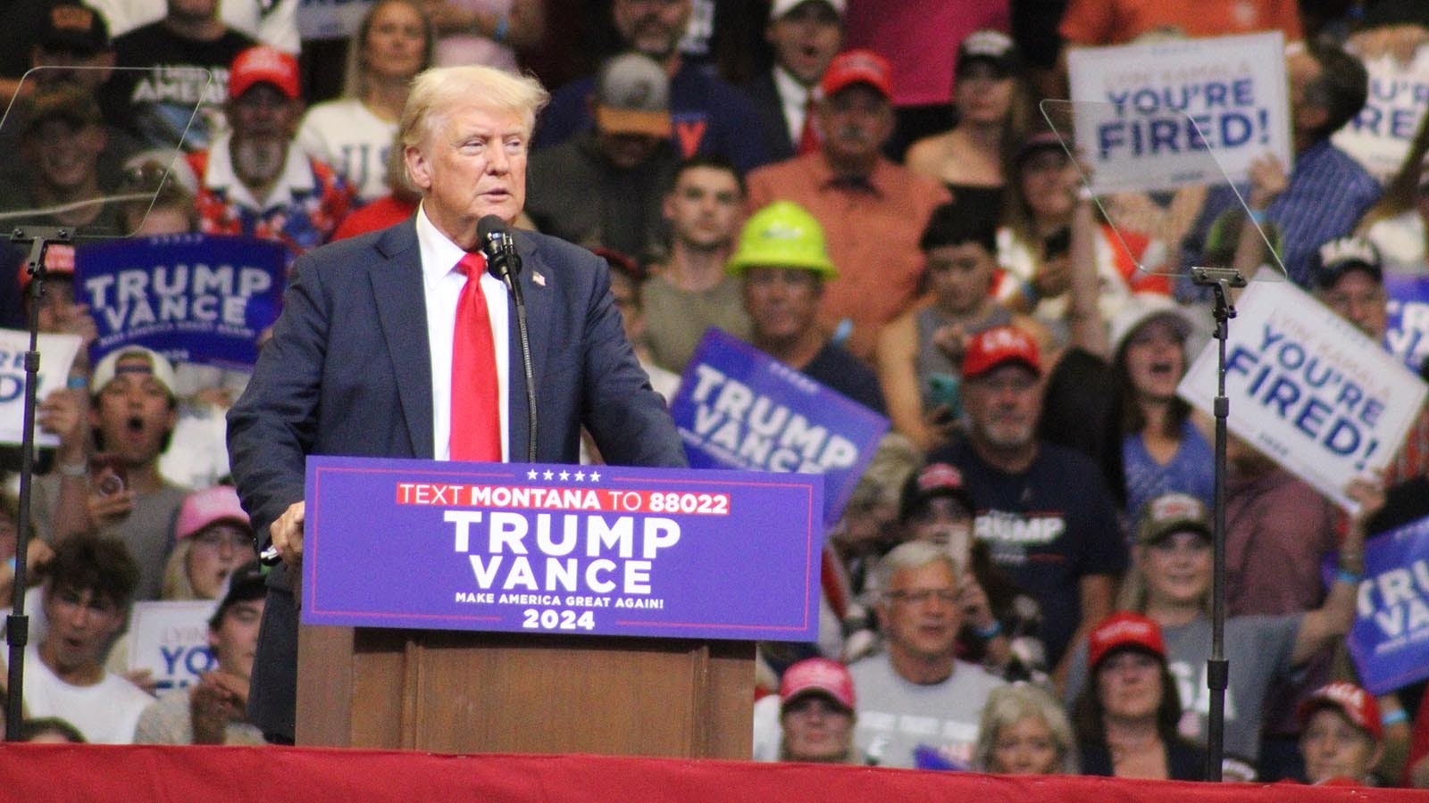 Former President Donald Trump speaks to a packed house of supporters during Friday's rally in Bozeman, Montana.