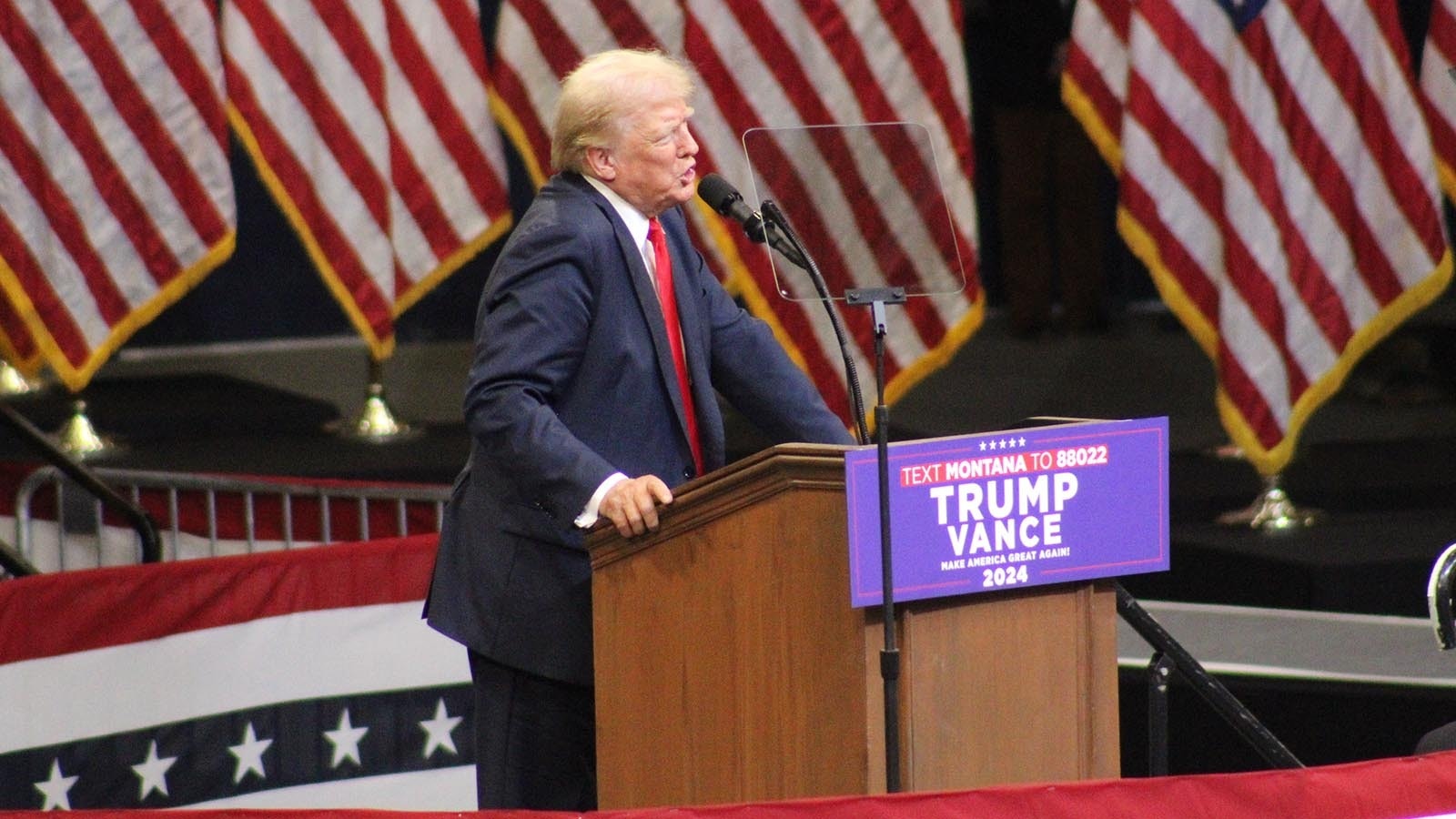 Former President Donald Trump speaks to a packed house of supporters during Friday's rally in Bozeman, Montana.