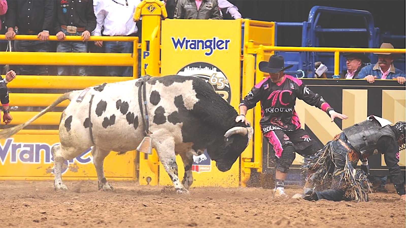 This is modern-day rodeo bullfighting at its finest — Dusty Tuckness steps into the gap to take on a bull and give a rider a chance to get away unharmed.