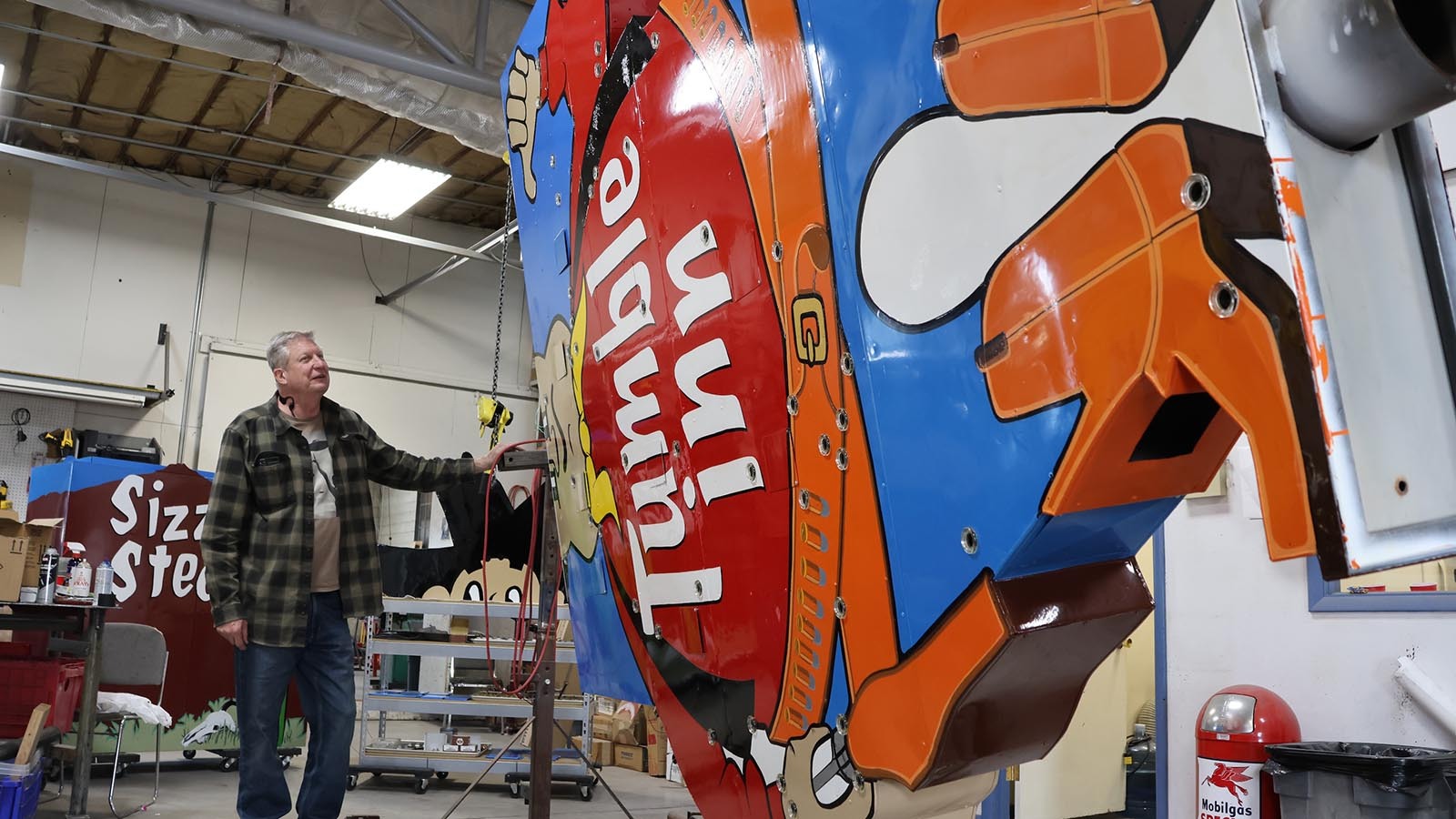 The big 21-foot Tumble Inn Cowboy is all painted and ready for his lights. Owner John Huff says a firm date for his installation in Casper is hard to determine.