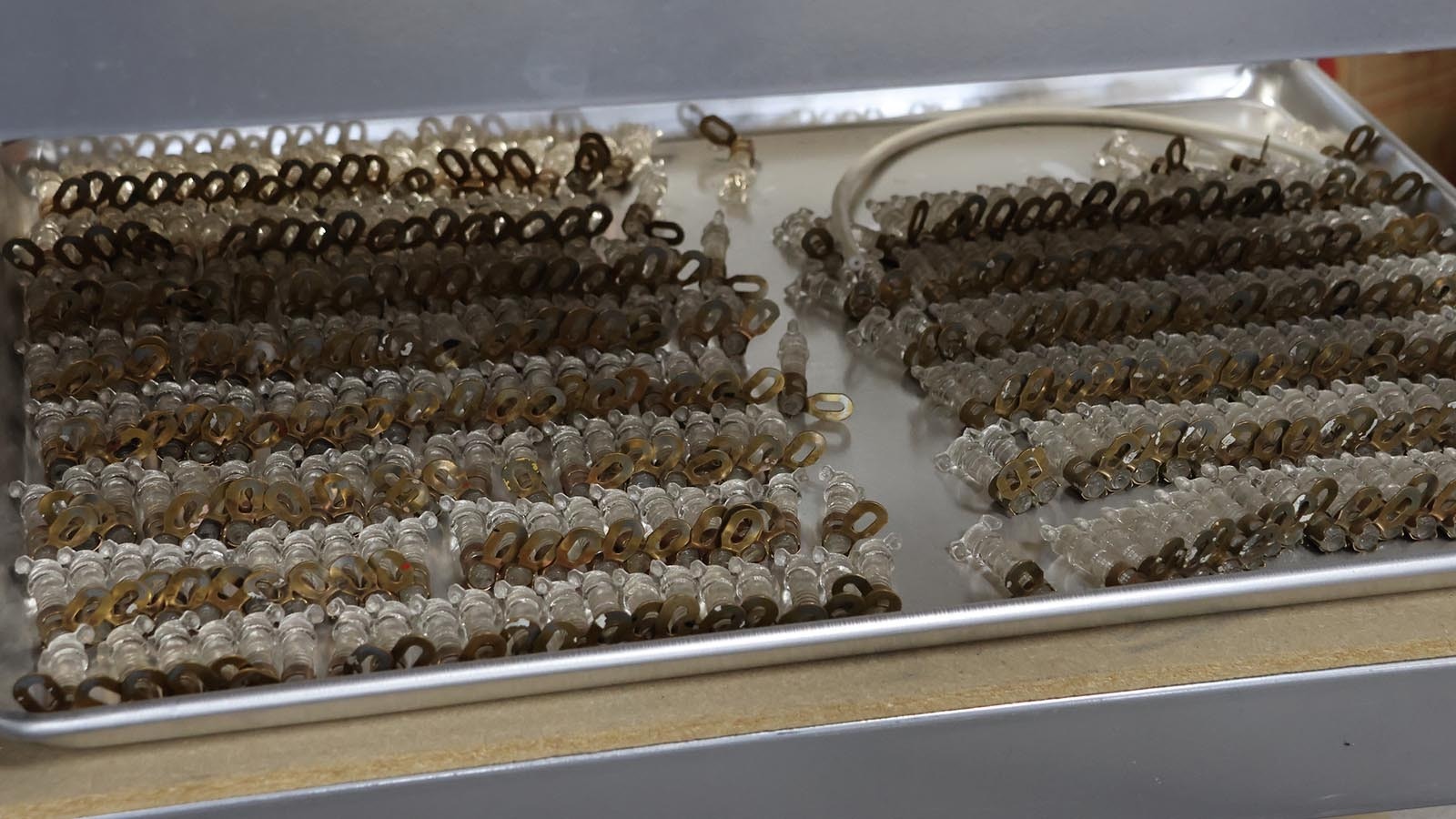 A tray of material for the neon glass installation is ready to go.