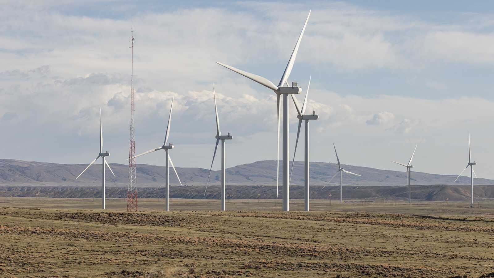 Wind turbnbes turn in Carbon County, Wyoming.