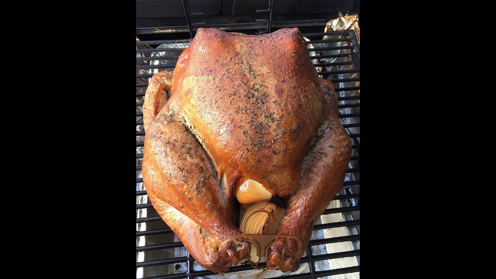 A lemon cut in half and placed under the skin gives this Thansgiving bird a more grown-up look.