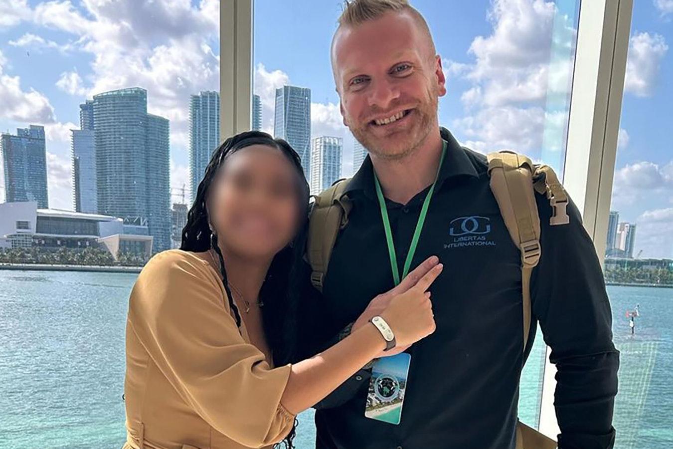 Tyler Schwab poses with one of more than 3,000 sex trafficking survivors his nonprofit has helped.