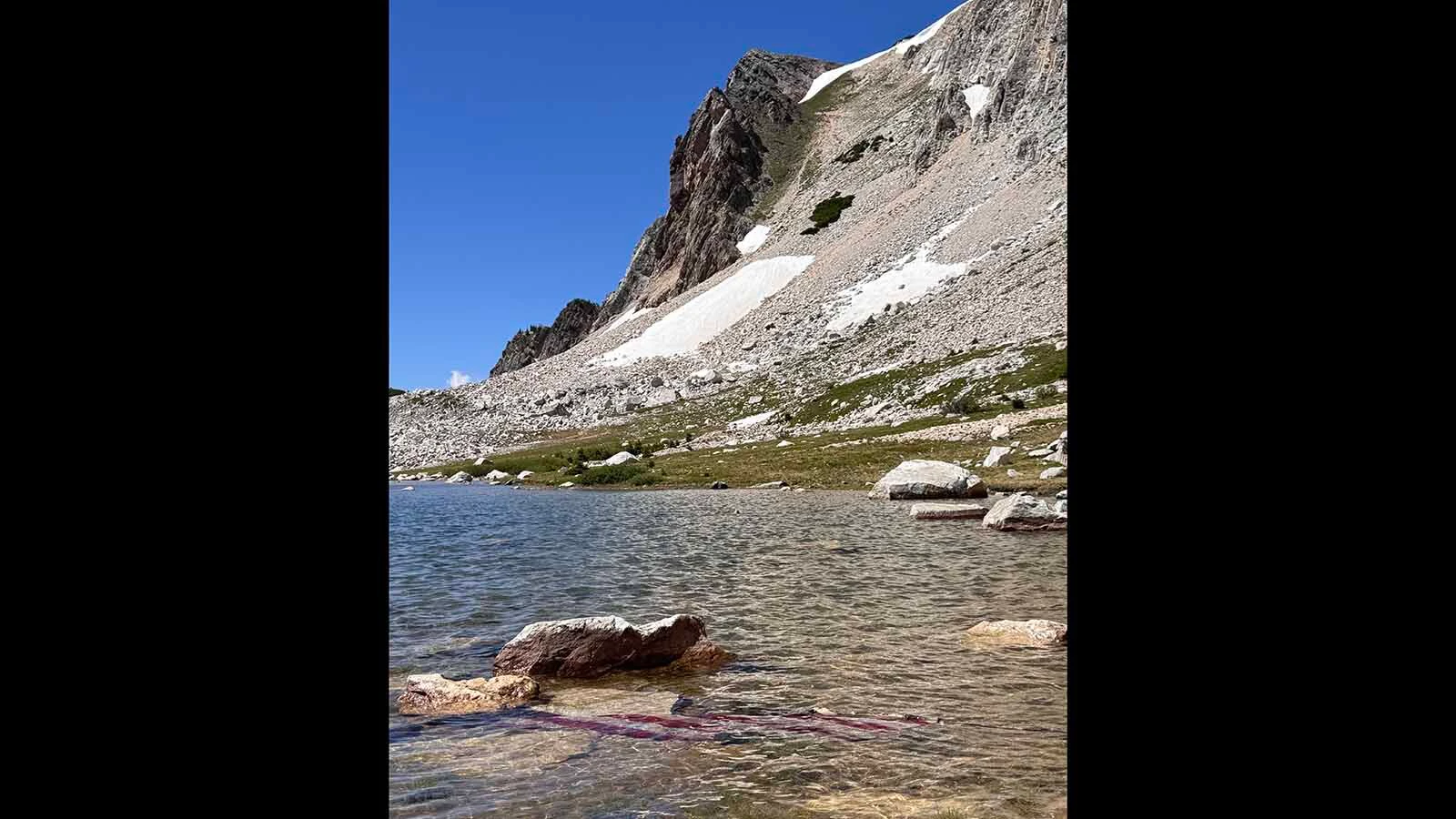 A pond of water sits near the Medicine Bow Peak crash site.
