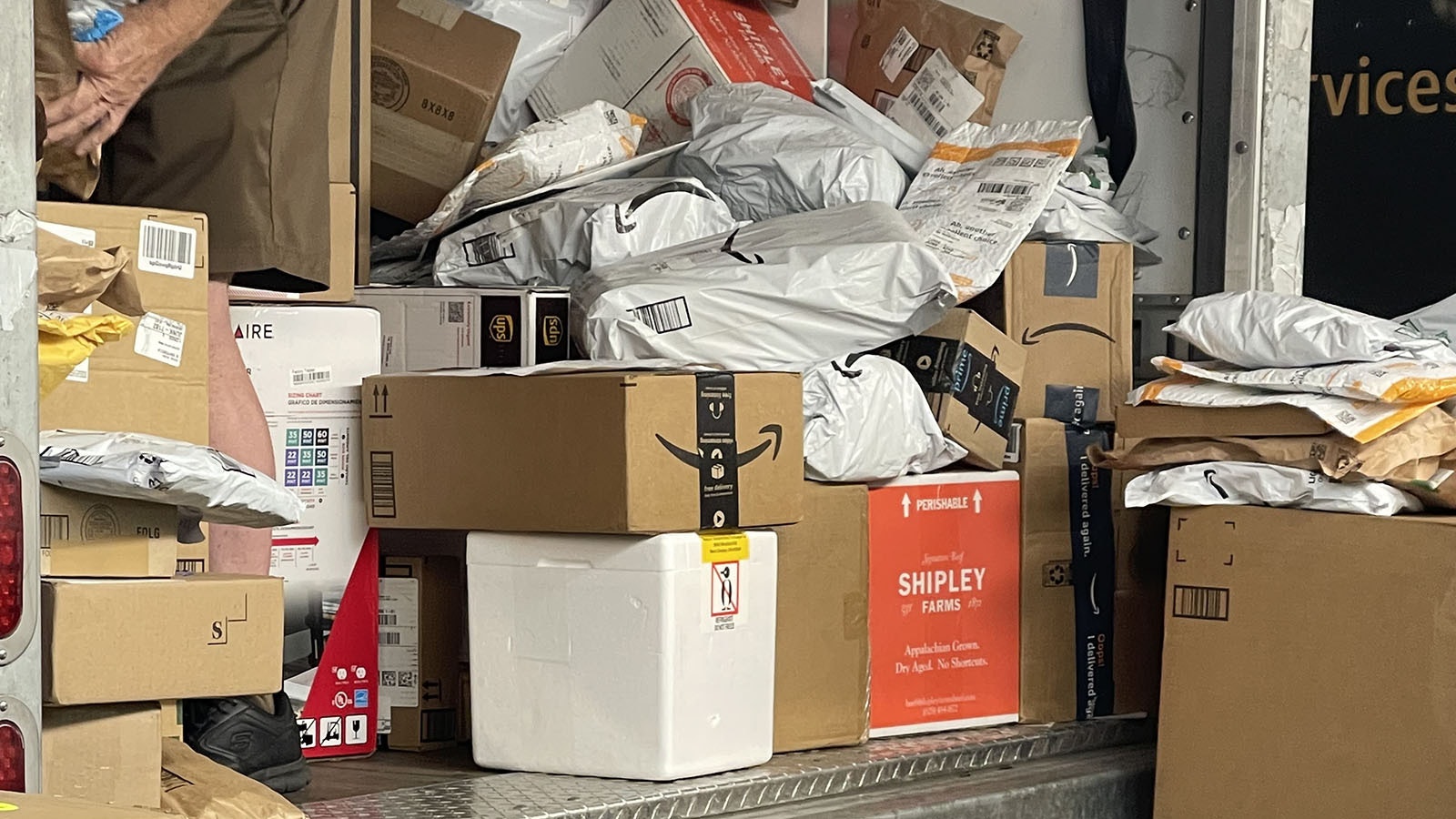 A trailer in a UPS warehouse in the eastern part of the United States is stuffed with what the company calls the rural deferment for the day. That is, the packages on rural routes that were supposed to be delivered that day but for whatever reason weren’t. Center front of the trailer is a white Styrofoam container that was supposed to be a next day critical health care delivery. This photo was provided to Cowboy State Daily by a current UPS driver.