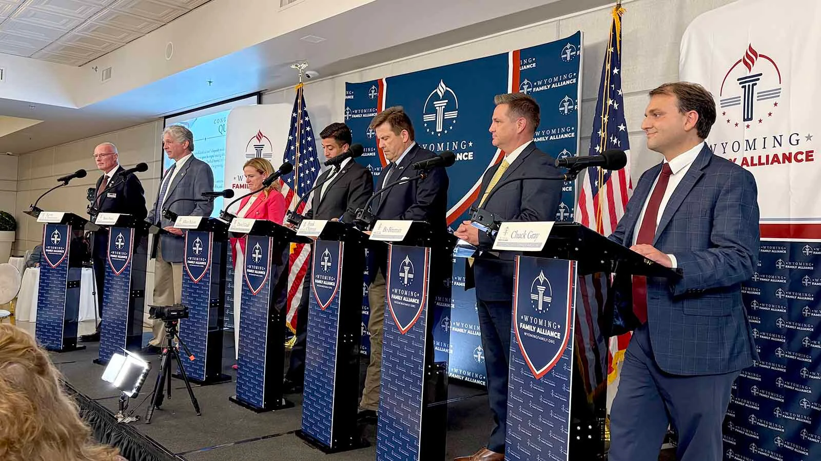 From left, Chuck Gray, Bo Biteman, Frank Chapman, David Giralt, Jillian Balow, Steve Friess, and Kevin Christensen. The seven U.S. House candidates fielded faith-oriented questions Tuesday in front of a largely Christian audience at the Cheyenne Metropolitan.