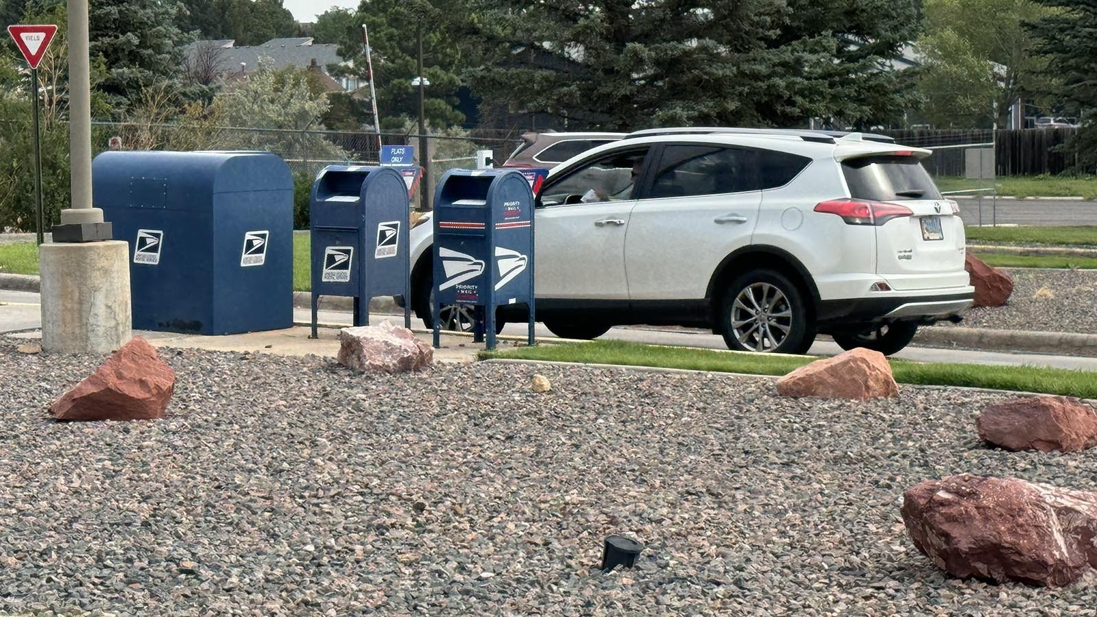 Customers use the drive-thru drop-off boxes at the U.S. Post Office annex at 4800 Converse Ave. in Cheyenne.