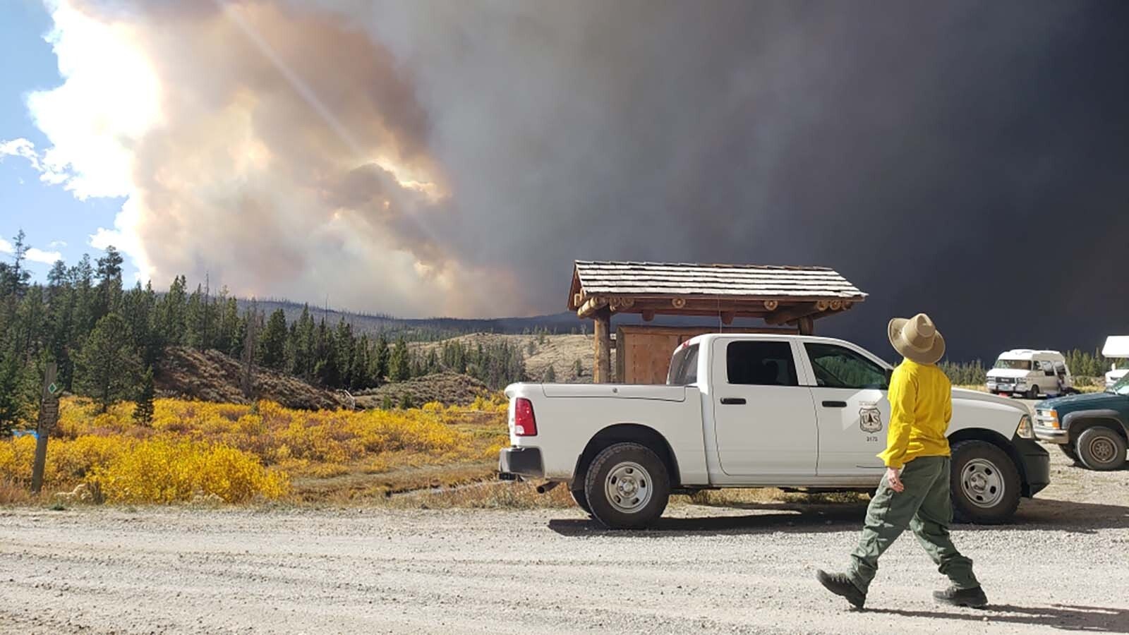 The fast-growing Pack Trail Fire just southeast of the Fish Creek Fire has grown rapidly, with firefighting crews now treating the two fires as a single Fish Creek/Pack Trail complex. Both are burning in the Shoshone National Forest and threatening Highway 26 and nearby residential areas.