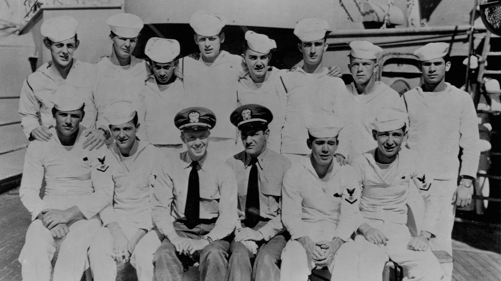 Future US President Jimmy Carter, below third from left, poses with sailors aboard USS Wyoming.