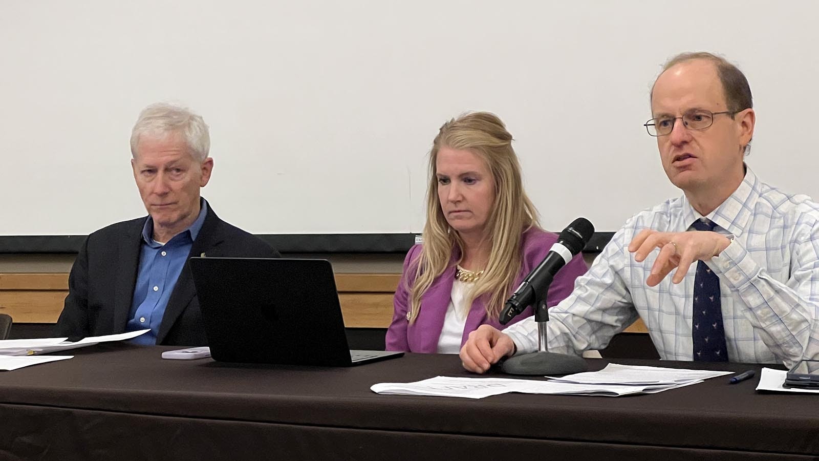 George Mocsary, director of the Firearms Research Center and professor at the University of Wyoming College of Law, speaks Monday at a town hall meeting regarding possibly allowing concealed carry firearms on the UW campus. Also pictured are (from left) UW Chief of Police Josh Holland, UW President Ed Seidel, and UW Vice President and General Council Tara Evans.