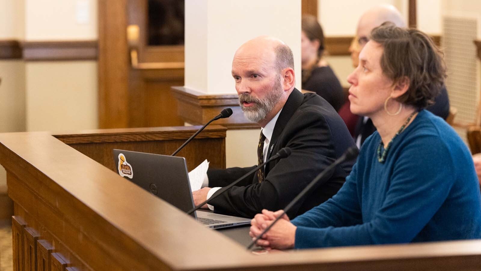 Mike Smith, vice president of governmental affairs for the University of Wyoming, testifies during an animated hearing about the UW Lab School on Wednesday.