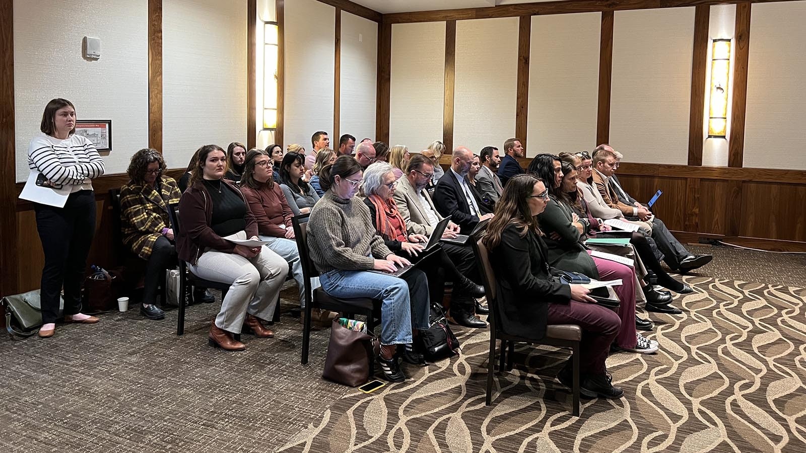 People wait to testify before the University of Wyoming Trustees on Thursday, regarding a proposal to allowed the concealed carrying of handguns on the UW campus. Most of those who came forward to talk spoke against the proposal.