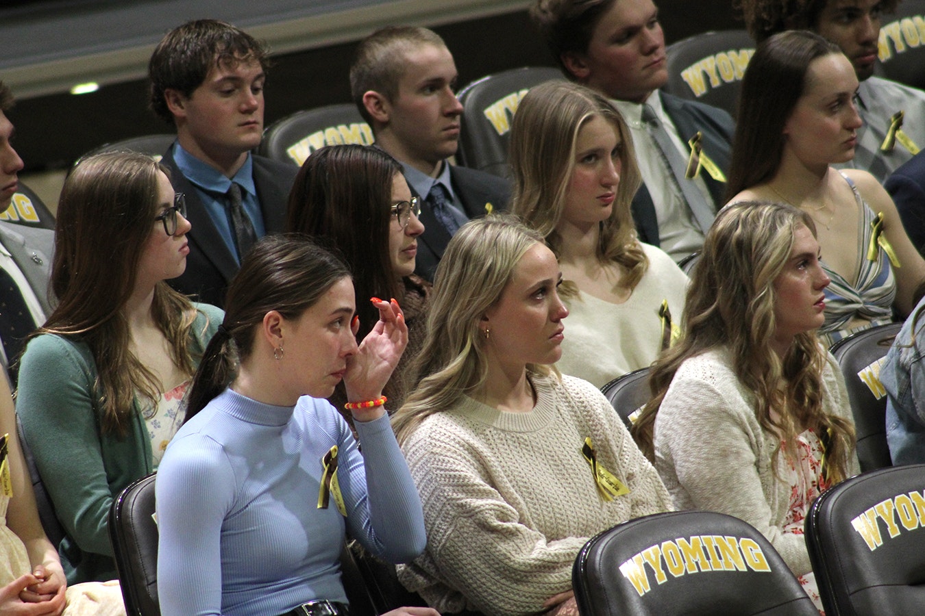University of Wyoming student athletes are emotional during Wednesday's memorial for three swim team members who were killed in a car crash Feb. 22, 2024.