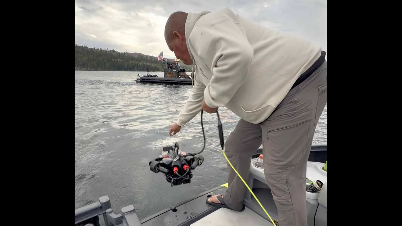 Search teams battled harsh conditions Saturday, Aug. 29, 2026, and used specialized equipment to raise a 55-gallon barrel off the bottom of Fremont Lake. They are hopeful it contains the body of Virginia Uden who, along with her two sons, was killed in 1980 by her ex-husband.