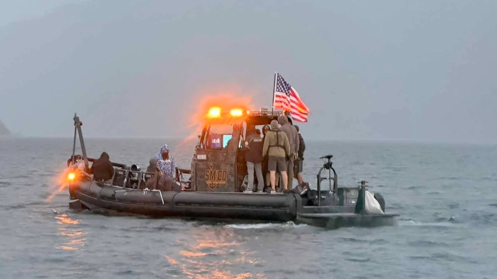 Search teams battled harsh conditions Saturday, Aug. 29, 2026, and used specialized equipment to raise a 55-gallon barrel off the bottom of Fremont Lake.