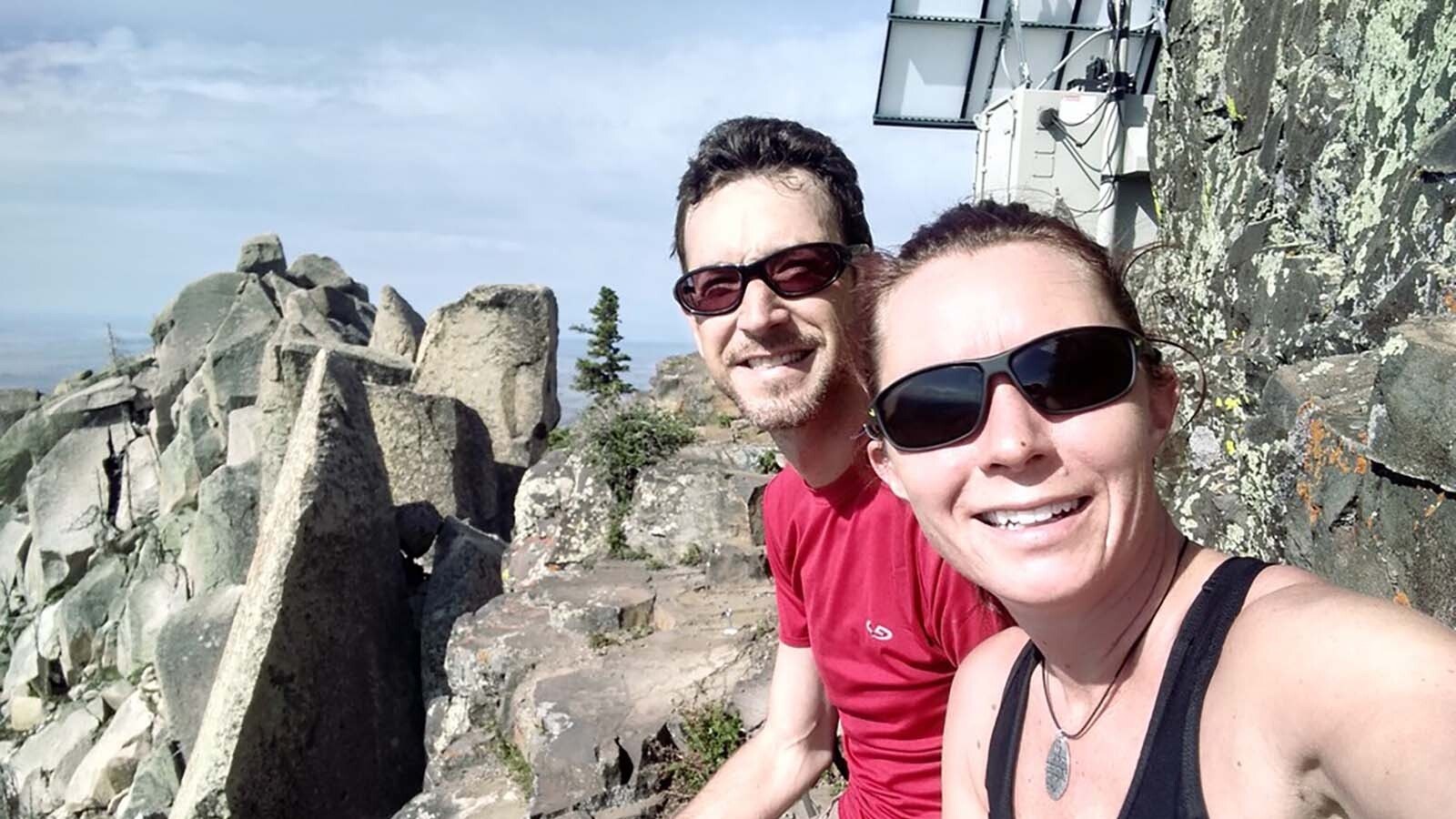 Scott and Tiffany Sink take a selfie from the top of Laramie Peak.
