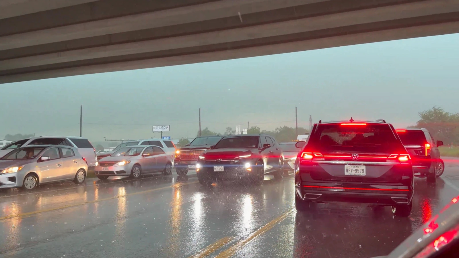 Drivers on a Texas highway stopped under an overpass during a hailstorm caused a traffic jam and outraged people stuck out in the hail. It’s not legal, and trying that in Wyoming would get someone a ticket — or worse if they cause a crash.
