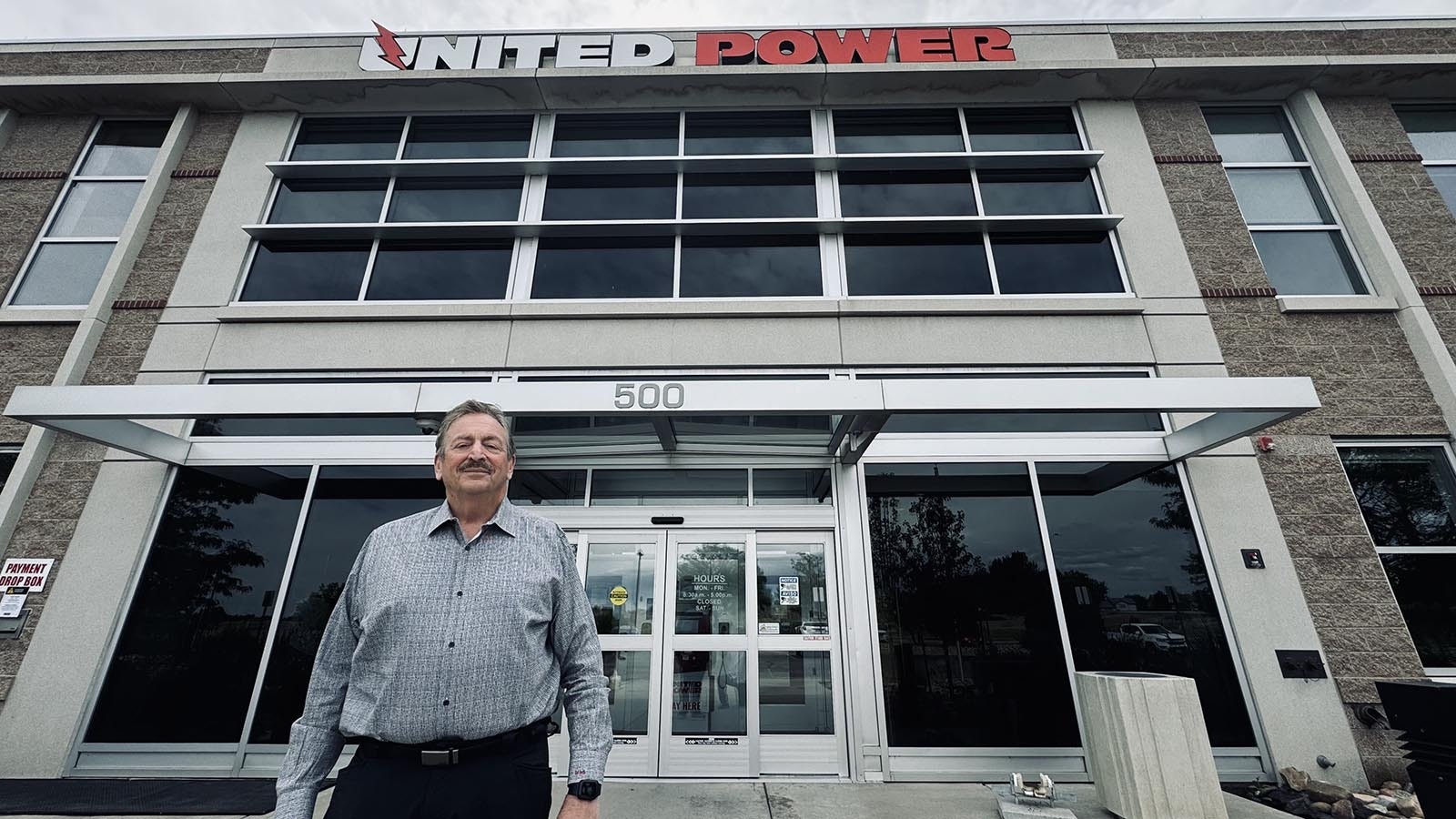 Mark Gabriel, president and CEO of Brighton, Colorado-based United Power Inc., stands in front of the headquarters building of his rural electricity cooperative. Gabriel led the breakaway of United Power from Tri-State Generation and Transmission Association in May.