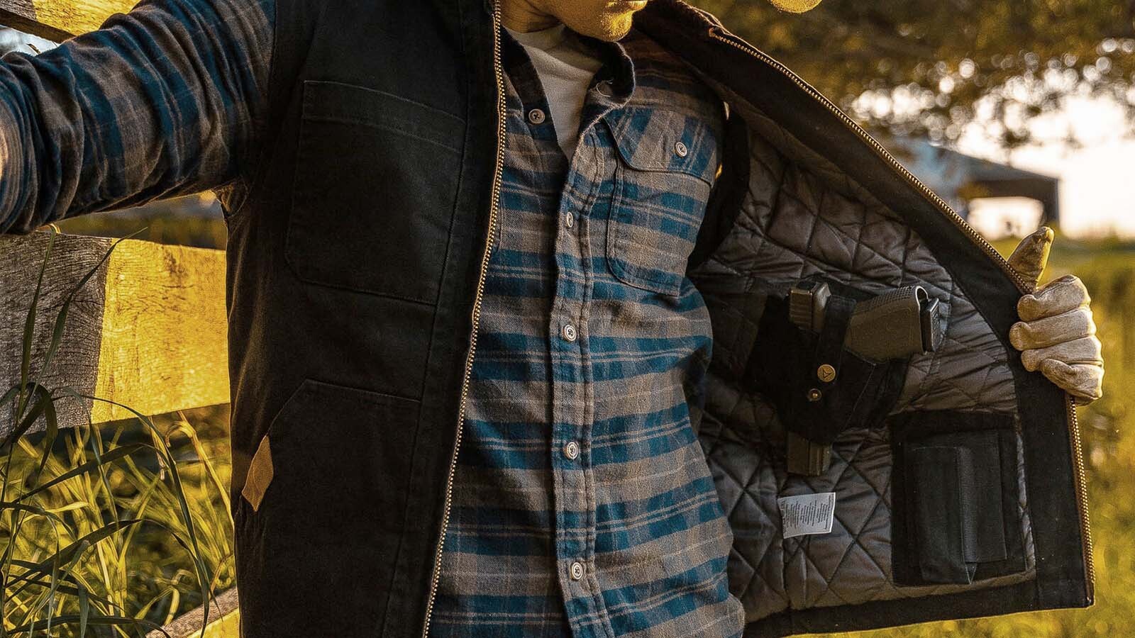 Garments with built-in concealed carry handgun holsters are nothing new, but they’ve become more popular lately, with Wyoming eliminating gun-free zones, and a push nationwide for concealed carry permits. This canvas vest made by Venado has multiple holsters.