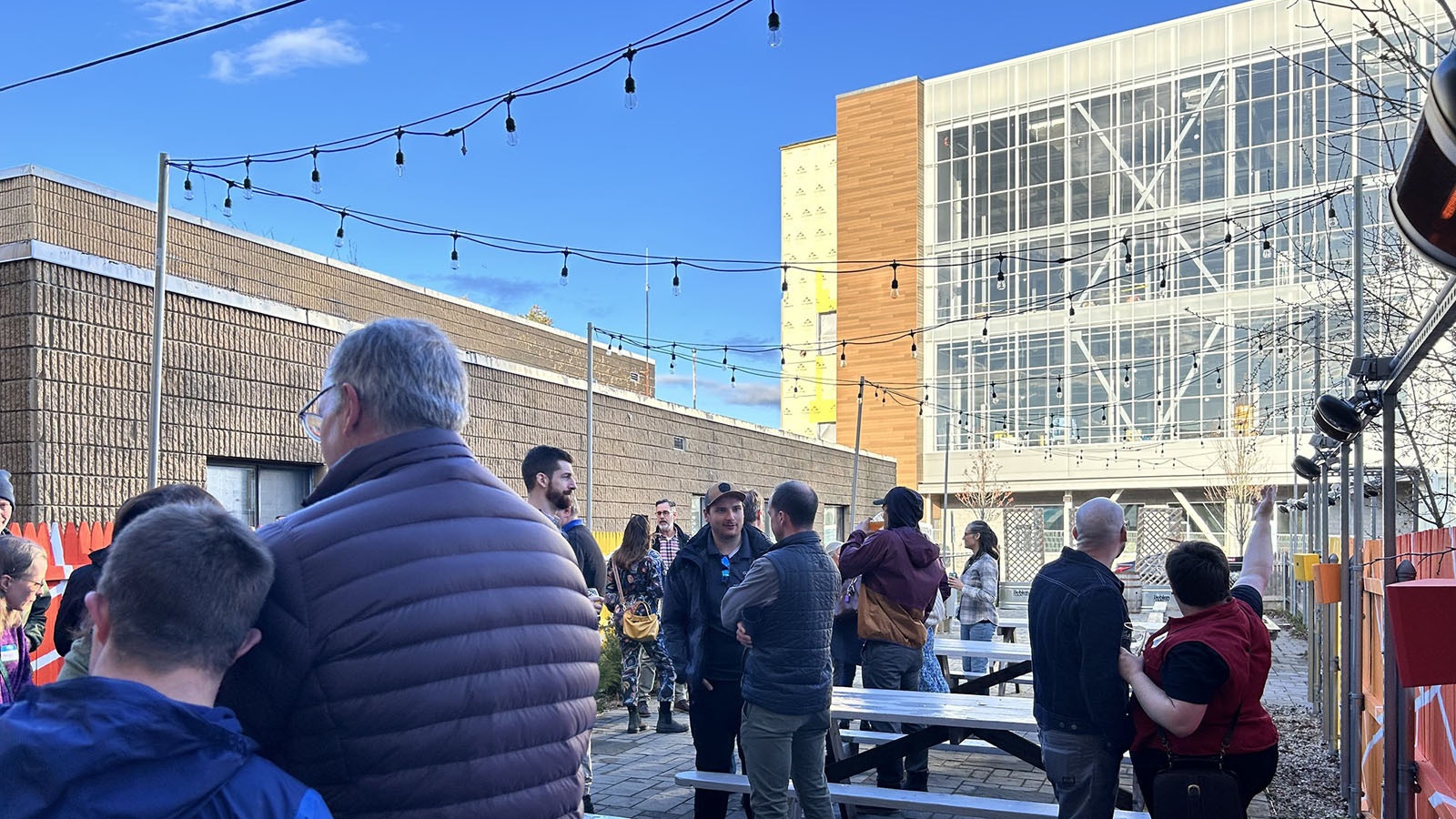 A party outside the Vertical Harvest flagship facility in Jackson, Wyoming.