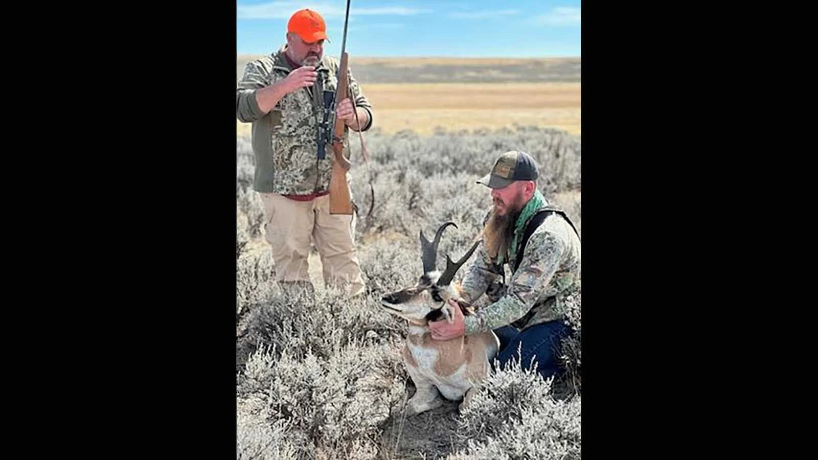 Disabled veteran Greg Hurley, left, and his guide Judson Thoren enjoy a pronghorn hunt through the Hunting With Heroes Wyoming program.
