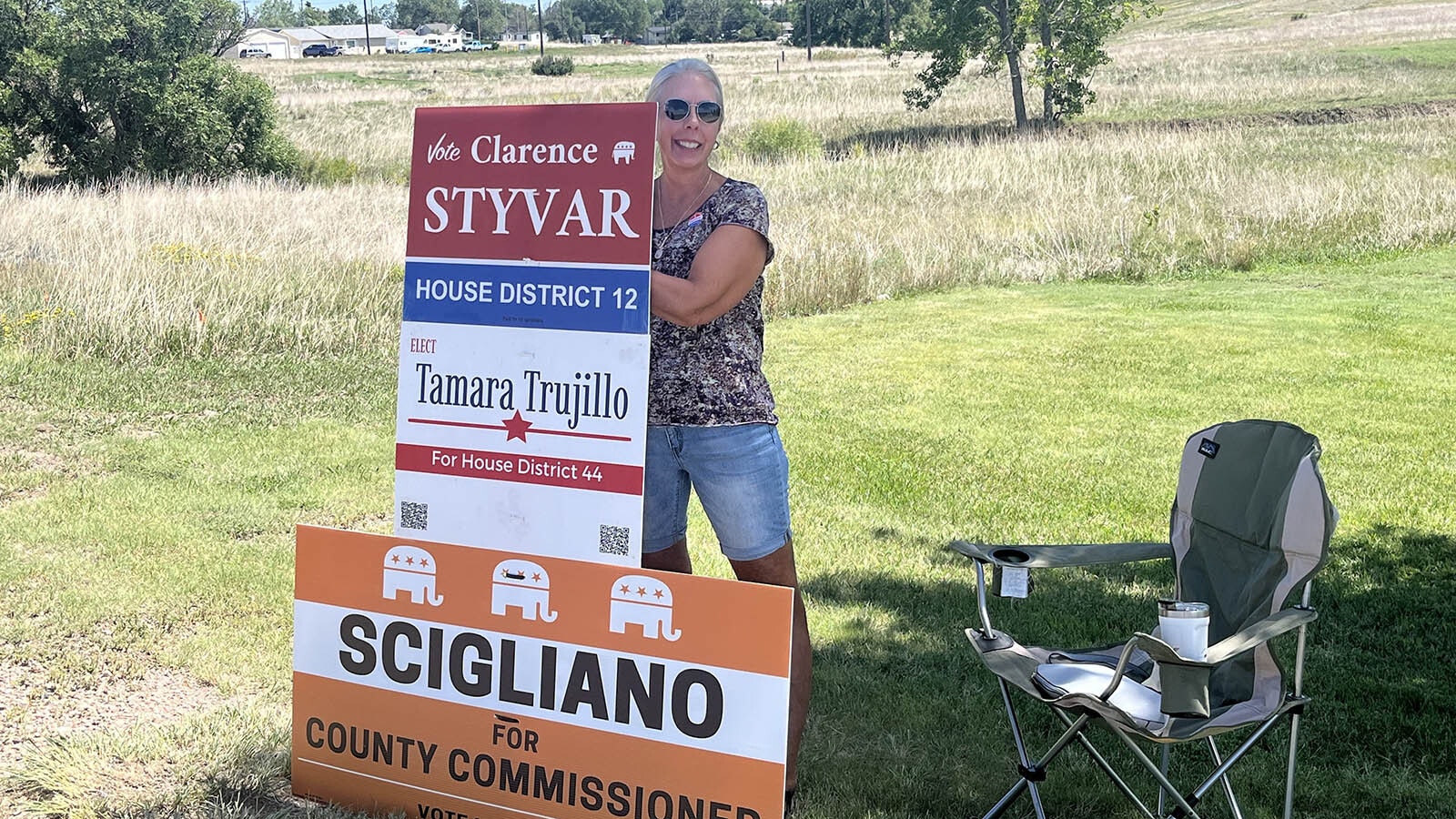 Laramie County School District 1 Board Trustee Susan Edgerton campaigns outside a polling place in south Cheyenne.