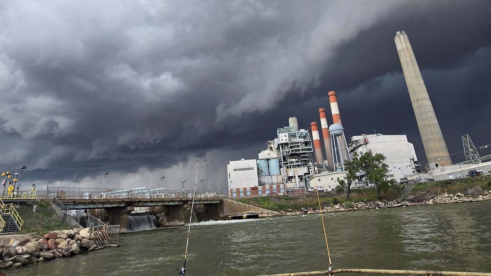 Fishing across from a power plant by Jacob Kuhn.