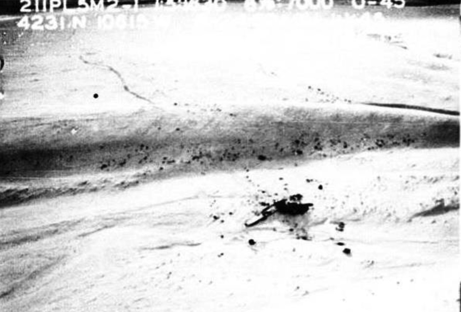 An aerial photo of the crash site in 1945 helped Mark Milliken develop a strategy using Google Earth to locate the crash site.