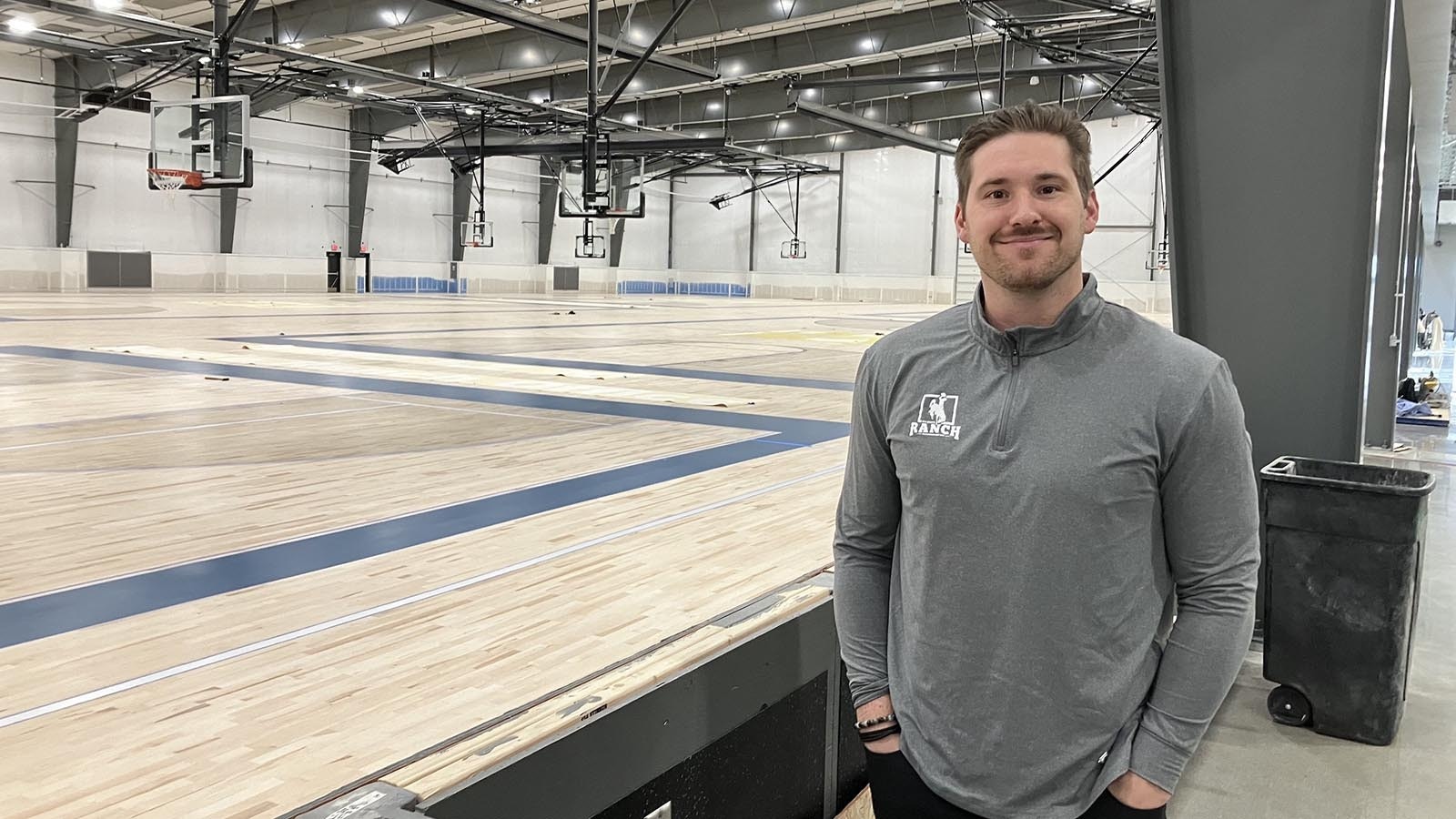 Wyo Complex Executive Director Luke Gilliam oversees the operations at the Wyo Sports Ranch. Behind is the court area that houses six permanent courts that can easily be changed for basketball or volleyball in minutes.