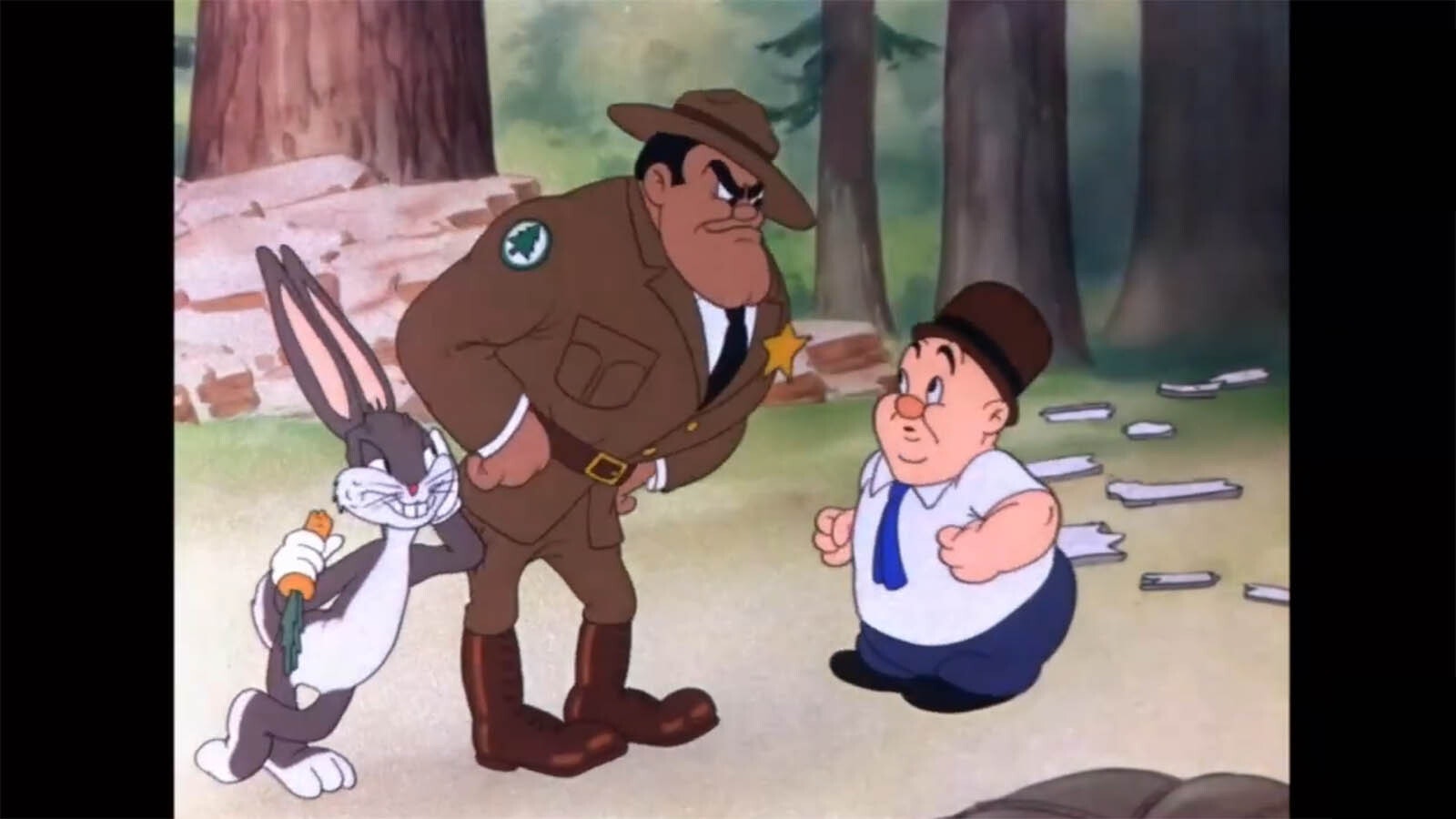 Elmer Fudd is condronted by an angry park ranger in the 1941 classic cartoon set in Yellowstone, "Wabbit Twouble."