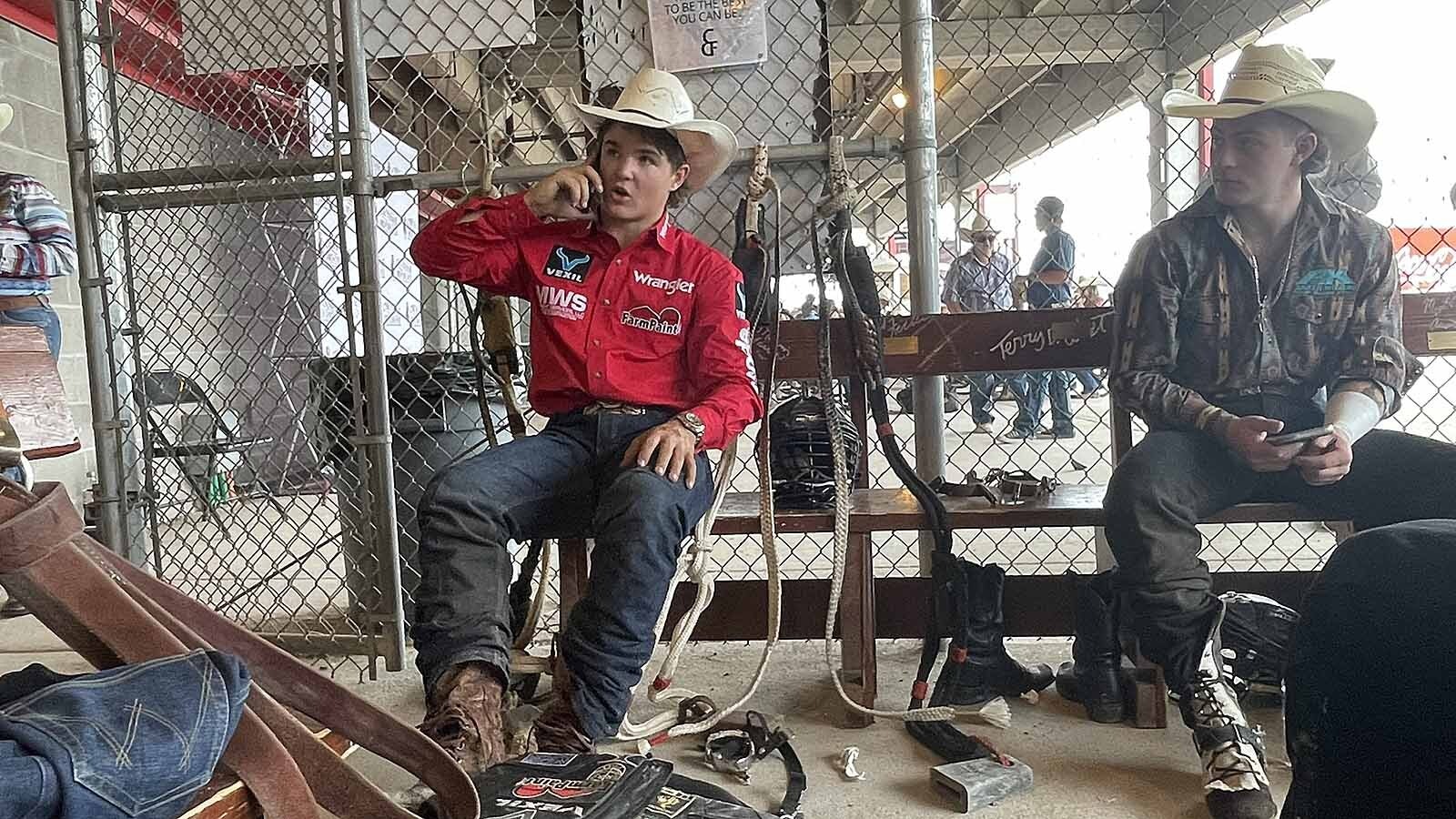 Wacey Schalla talks with family from the rider ready area of Frontier Stadium after a ride.