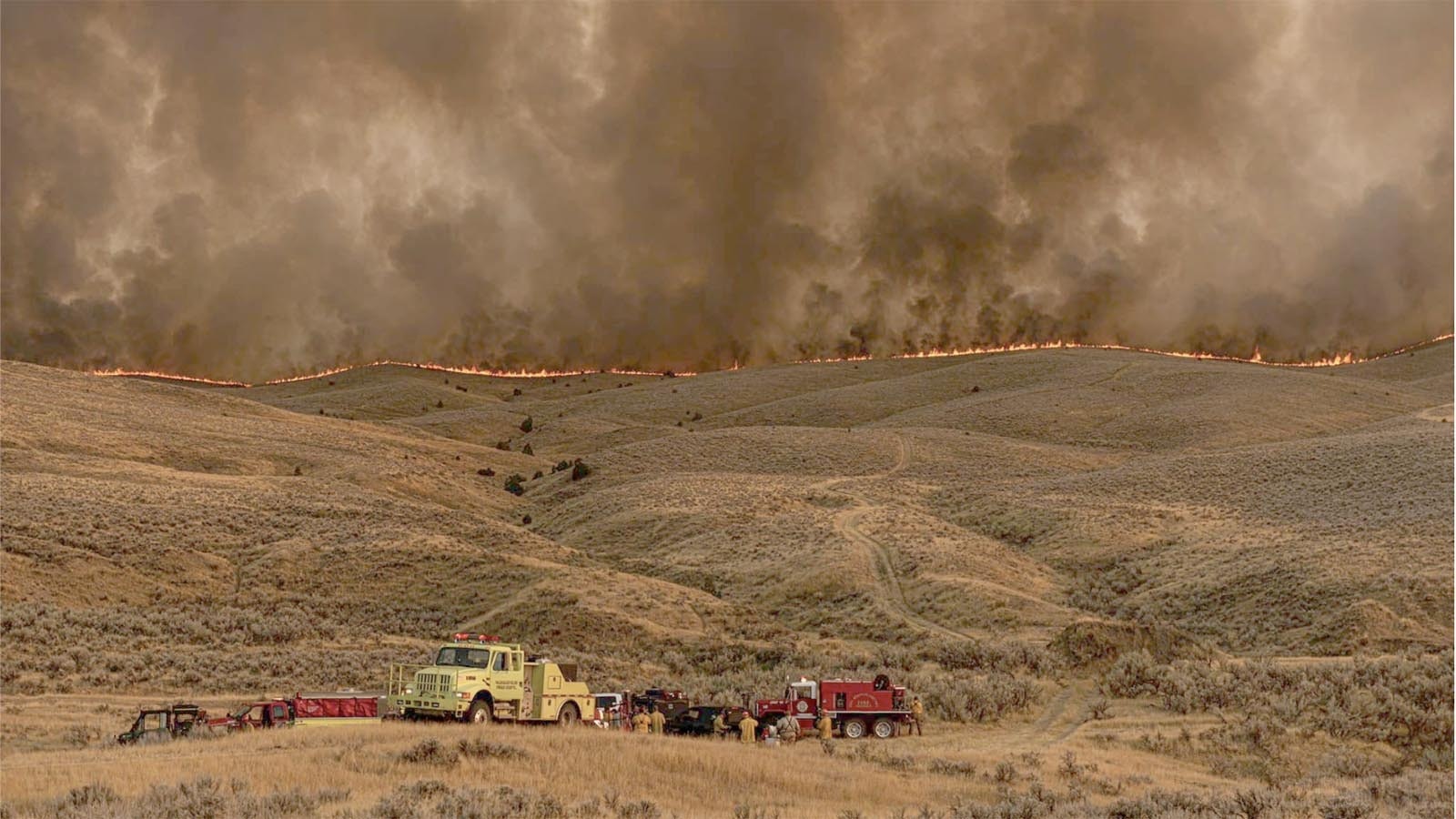 Warm Springs Fire from about half a mile away as fire crews set up near the fire line.