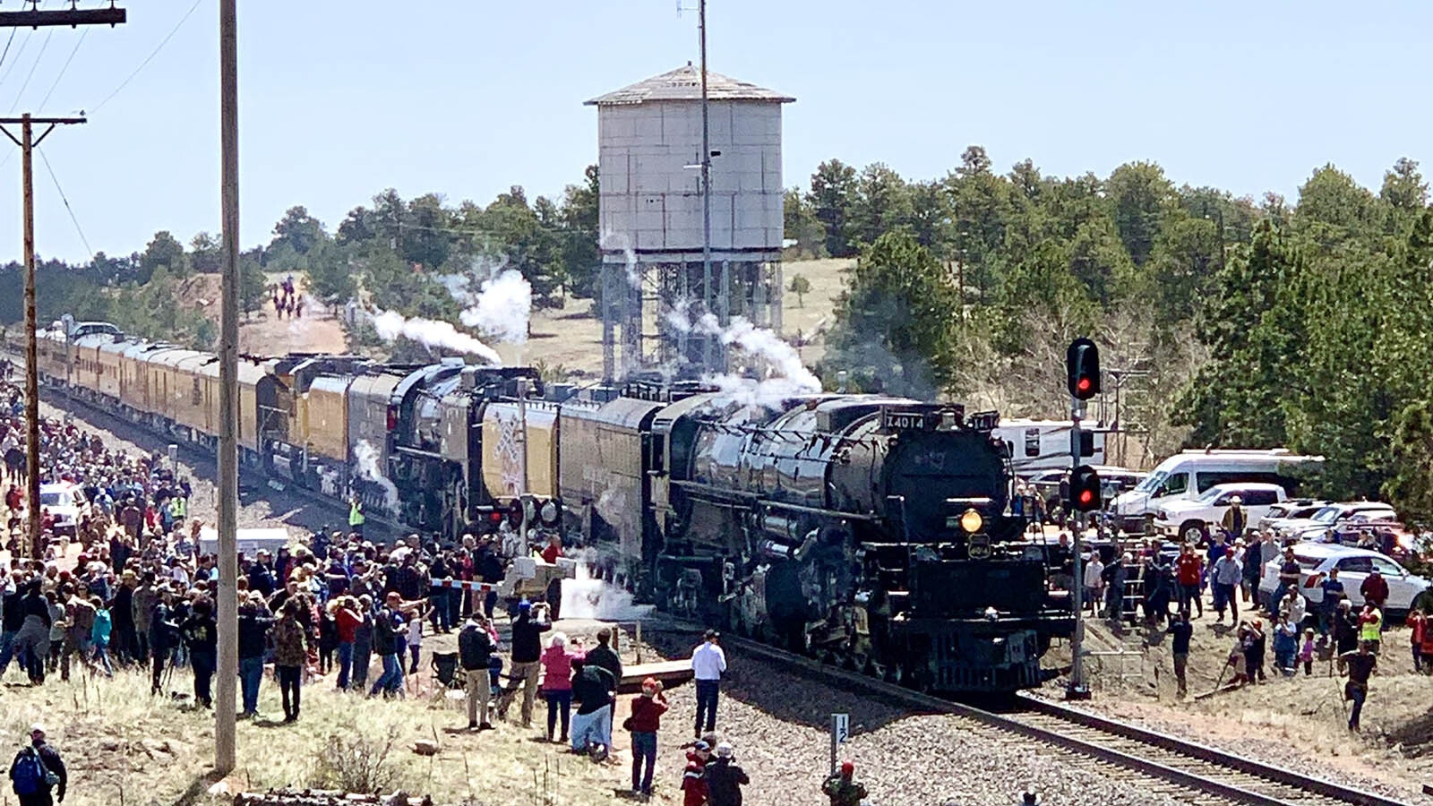 A historic water tower along the Union Pacific line near the Wyoming-Colorado state line at Harriman, Wyoming, was a local landmark for about 80 years. Now it’s gone, torn down Dec. 17, 2024, without notice or discussion, leaving locals and railroad buffs livid. In this photo, hundreds of people gather by the tower to watch Big Boy 4014 pass through.