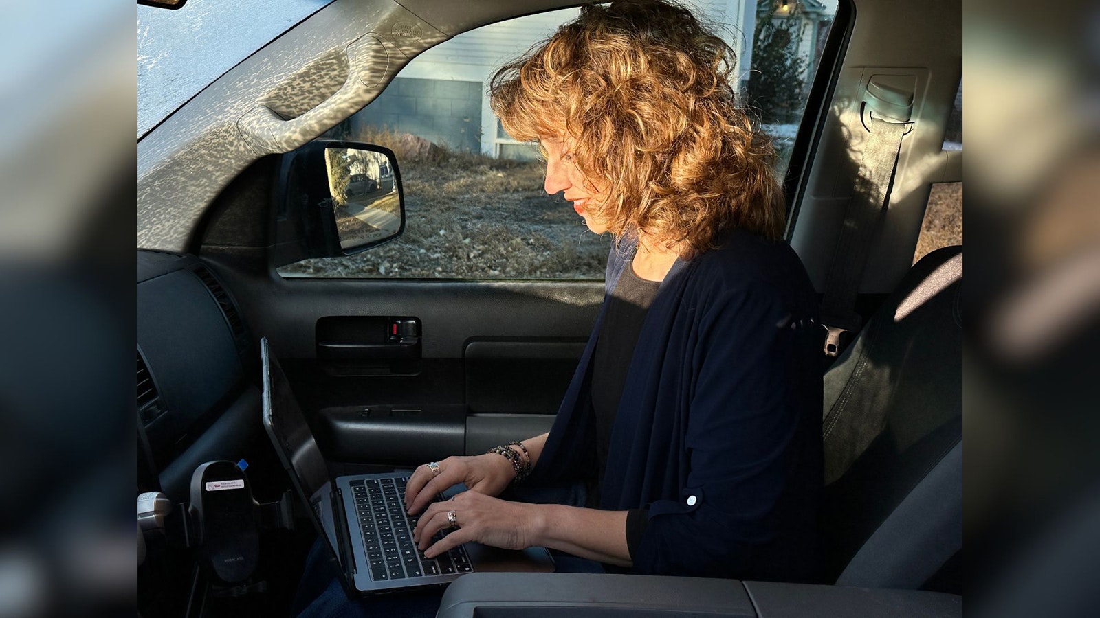 When on the road playing and singing in Dan Miller's Cowboy Music Review, Cowboy State Daily's video news director Wendy Corr has to improvise to get the daily newscasts out.