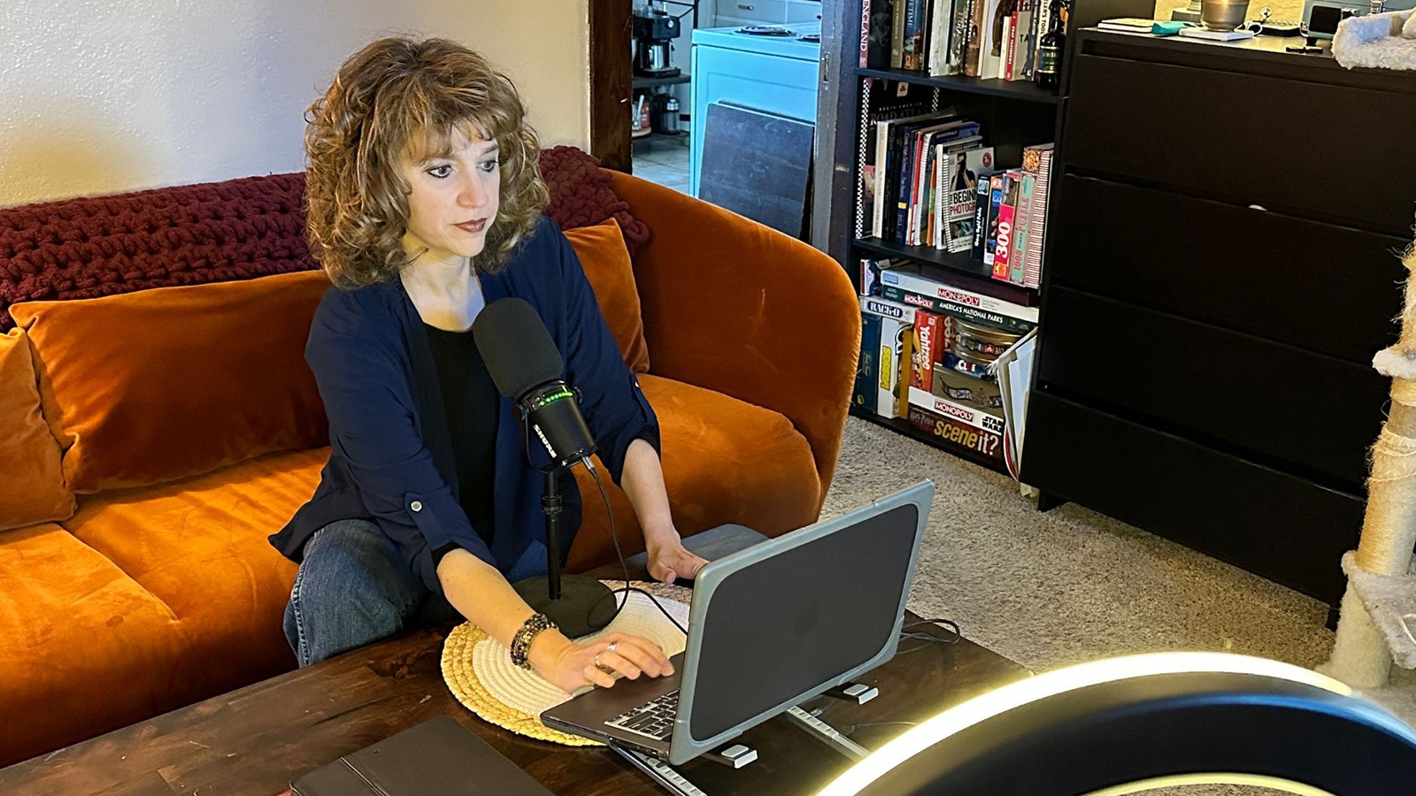 When on the road playing and singing in Dan Miller's Cowboy Music Review, Cowboy State Daily's video news director Wendy Corr has to improvise to get the daily newscasts out.