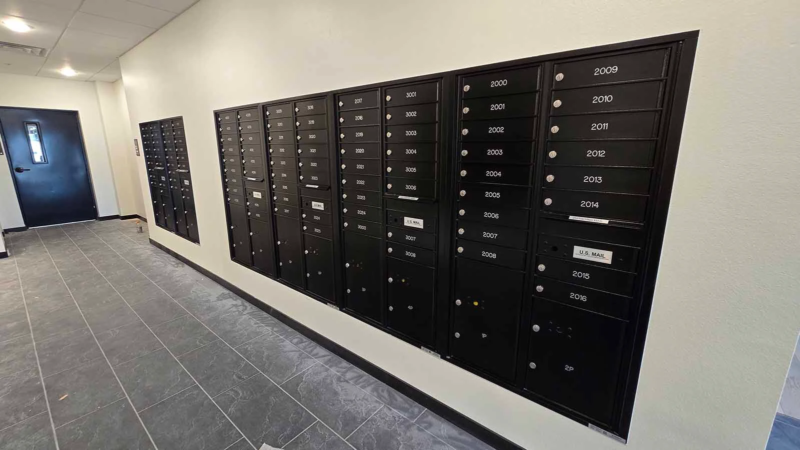 The postal boxes inside West End apartments.