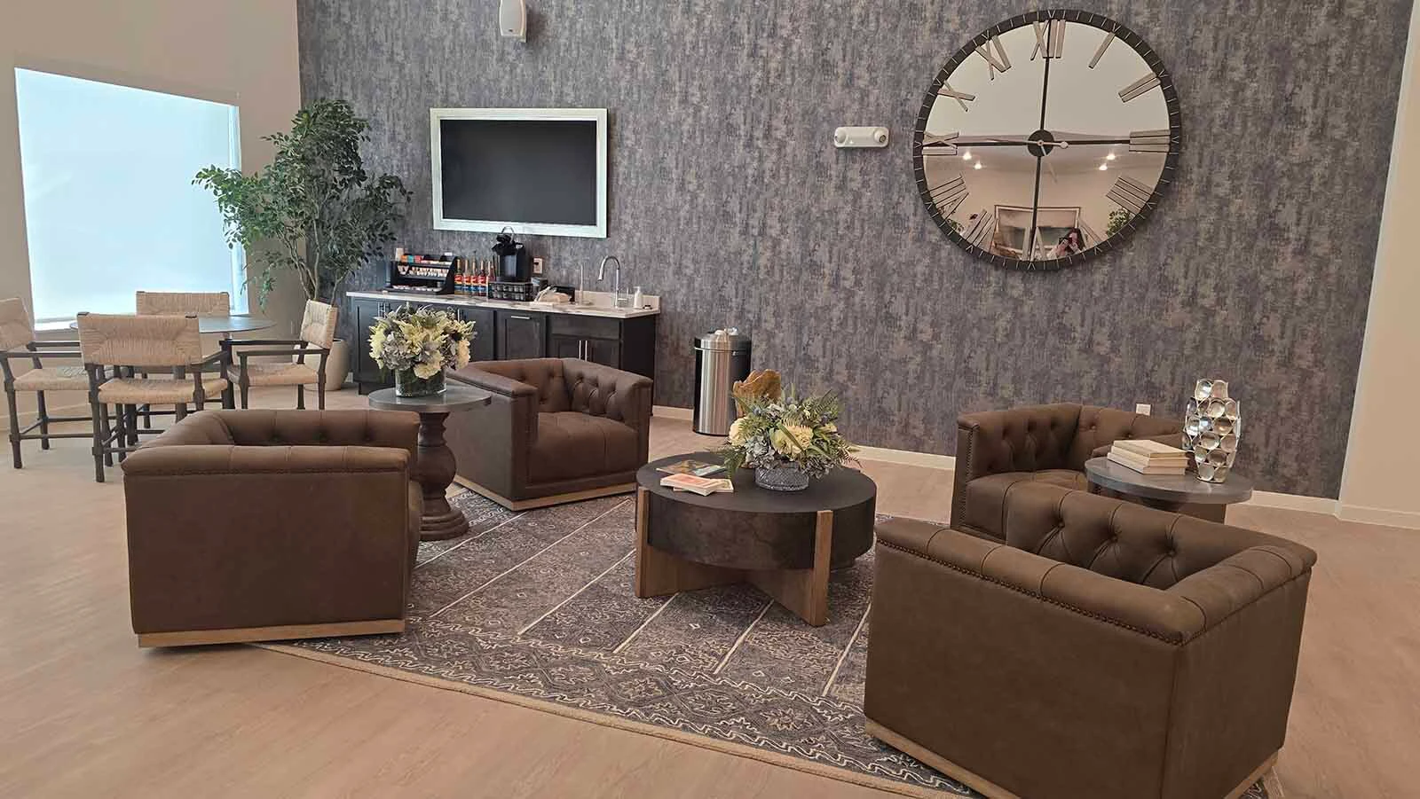 The lobby inside The Aire is an inviting space that includes a free coffee bar.
