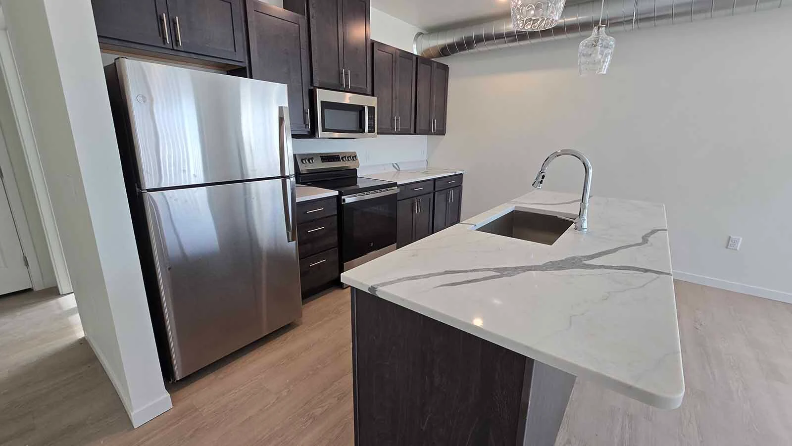 The kitchen space for the two-bedroom apartment in The Aire.