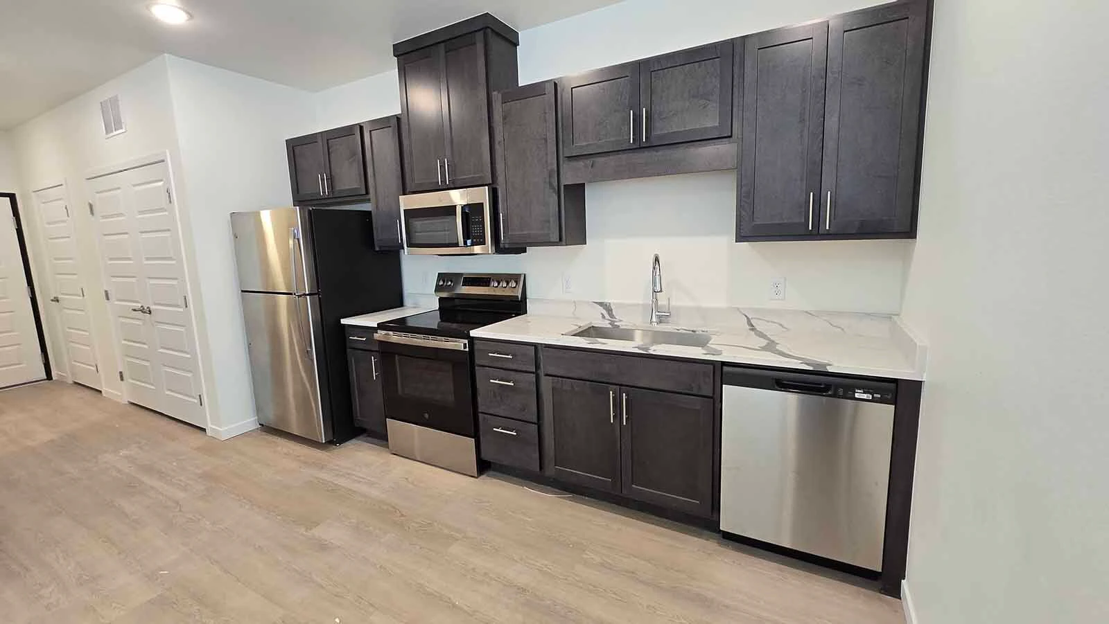 The kitchen in the 555-square-foot studio apartment at The Aire.