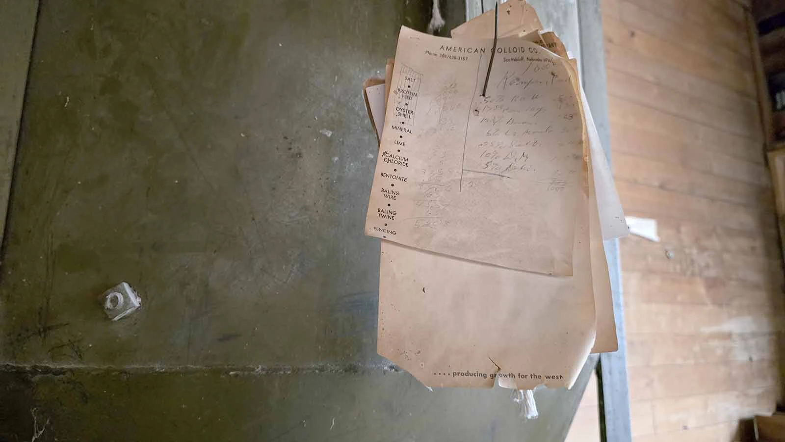 Previous order sheets still hanging inside the Ful-O-Pep grain elevator.